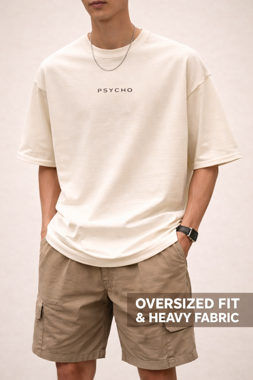 Person wearing an oversized fit and heavy fabric t-shirt with 'PSYCHO' branding.
