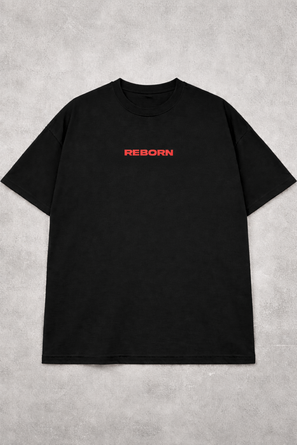 Black t-shirt with red 'REBORN' text on a gray concrete background