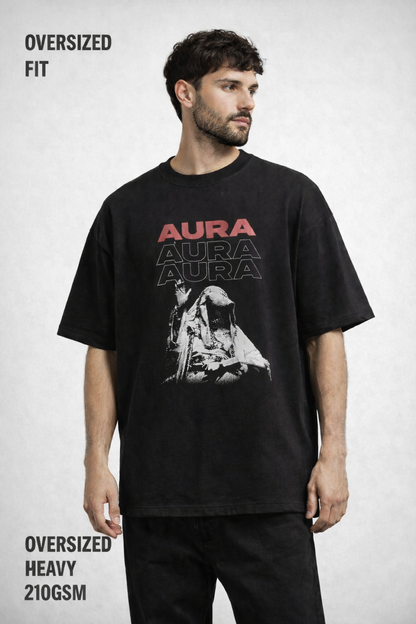 Man wearing a black t-shirt with 'Aura' branding on a white background